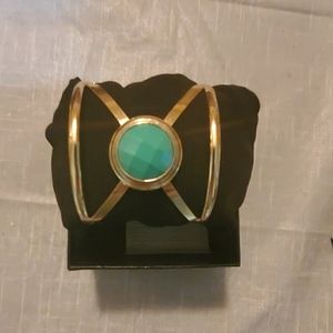Gold bracelet with blue green accent